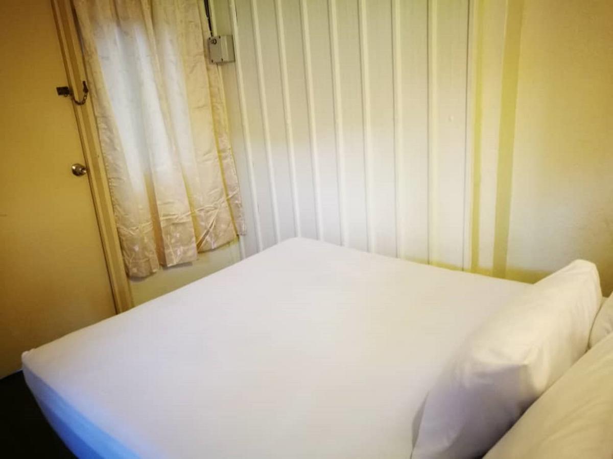 Grocer'S Inn Backpackers Guesthouse Куала-Лумпур Екстер'єр фото